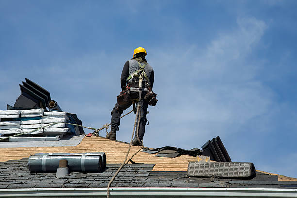 Professional Roofing technician working in Newport, OR
